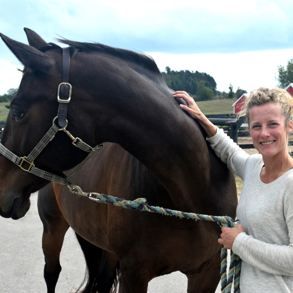 Photo of Kari Merz, Stables Manager and Director of Human Resources at Black Star Farms.