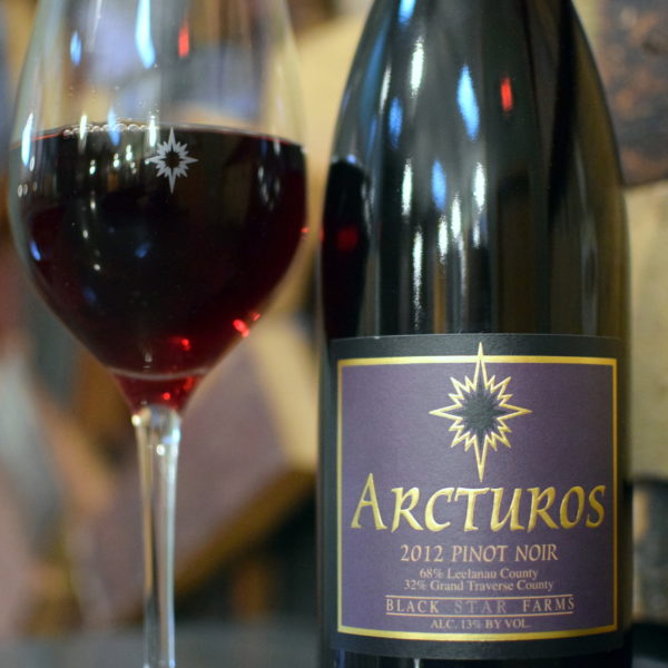 Bottle and glass of Black Star Farms Arcturos Pinot Noir.