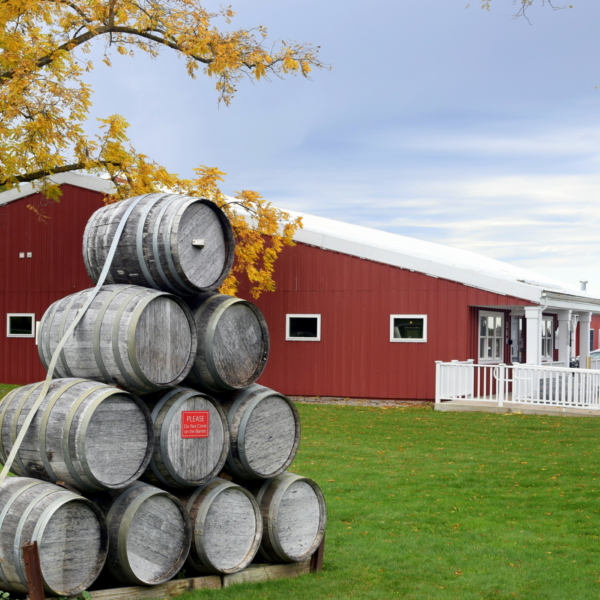 Stacked wine barrels at the entrance of Black Star Farms Old Mission.