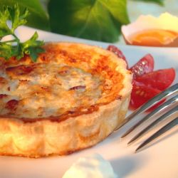 Savory quiche on a plate.
