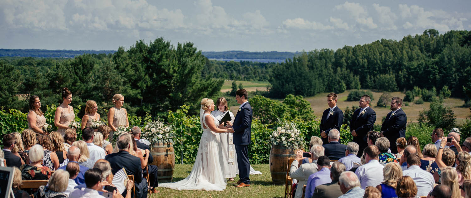 A gorgeous wedding with a view at Black Star Farms, one of the most sought after Traverse City wedding venues